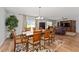 Formal dining room open to the living room with a view of the backyard at 1532 Angler Ave, Kissimmee, FL 34746