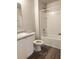 Clean bathroom with a shower-tub combination, vanity, and modern toilet at 158 Violet Ct, Poinciana, FL 34759