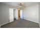 Bedroom with an open closet, neutral walls, and plush carpeting at 158 Violet Ct, Poinciana, FL 34759