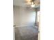 Cozy bedroom with neutral walls, ceiling fan, and natural light at 158 Violet Ct, Poinciana, FL 34759