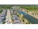 Aerial shot showcases the home's location by the pond with surrounding community at 17324 Bracken Fern Ln, Clermont, FL 34714
