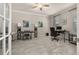 Spacious office with tile flooring, crown molding, and ample natural light at 17324 Bracken Fern Ln, Clermont, FL 34714