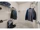 Spacious walk-in closet featuring ample shelving and hanging space for optimal organization at 17324 Bracken Fern Ln, Clermont, FL 34714