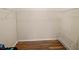 Walk-in closet with overhead shelving and laminate flooring at 1976 The Oaks Blvd, Kissimmee, FL 34746