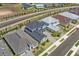 Beautiful aerial view of a neighborhood featuring modern homes with well-manicured lawns and paved driveways at 2110 Old Hollow Ln, Clermont, FL 34715