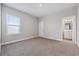 Bedroom with carpeted flooring, neutral walls, window letting in lots of natural light at 2110 Old Hollow Ln, Clermont, FL 34715
