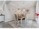 Elegant dining room with a large table, stylish chairs, and decorative accents at 2110 Old Hollow Ln, Clermont, FL 34715