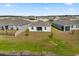 Aerial view displaying a property with a big backyard in the community at 2156 Merrybells Dr, Kissimmee, FL 34746