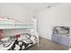 Bedroom featuring bunk beds, wall decor and television at 2156 Merrybells Dr, Kissimmee, FL 34746