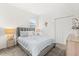 Comfortable bedroom featuring soft lighting, plush carpeting and a serene atmosphere at 2156 Merrybells Dr, Kissimmee, FL 34746
