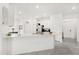 Spacious kitchen with white cabinetry, a large island, and stainless steel appliances at 2156 Merrybells Dr, Kissimmee, FL 34746