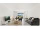 Bright living room with neutral tones and a view of the outside at 2156 Merrybells Dr, Kissimmee, FL 34746