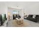 Bright living room with neutral tones and a view of the outside at 2156 Merrybells Dr, Kissimmee, FL 34746
