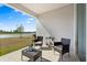 Relaxing outdoor patio with comfortable seating and serene lake views at 2156 Merrybells Dr, Kissimmee, FL 34746