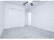 Bright bedroom with neutral carpet and a closet, offering a cozy and functional space at 2189 Teneroc Trl, Lakeland, FL 33801