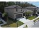 Beautiful two-story home showcasing its well-manicured lawn and inviting curb appeal at 2189 Teneroc Trl, Lakeland, FL 33801