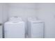 Practical laundry room equipped with a modern washer and dryer for convenience at 2189 Teneroc Trl, Lakeland, FL 33801