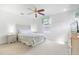 Serene bedroom features a queen-sized bed, soft color palette, and natural light, creating a peaceful retreat for rest and relaxation at 253 Aldridge Ln, Davenport, FL 33897