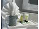 Elegant bathroom with complimentary toiletries, a towel and a stylish mirror at 2714 Rio Grande Trl # 2714, Kissimmee, FL 34741