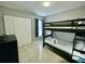 Bedroom featuring a bunk bed, closet space and tv at 2714 Rio Grande Trl # 2714, Kissimmee, FL 34741