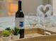 Bedroom setting with a bottle of wine, glasses, and a swan towel decoration on the bed at 2714 Rio Grande Trl # 2714, Kissimmee, FL 34741