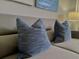 Comfortable living room couch with stylish pillows at 2714 Rio Grande Trl # 2714, Kissimmee, FL 34741