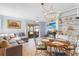 Bright living room with neutral tones, a sliding door to the outdoors, and stylish decor at 3122 Eleuthera Ln, Orlando, FL 32827
