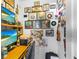 Functional office space with walls adorned with artistic records and a dedicated workspace at 3122 Eleuthera Ln, Orlando, FL 32827