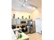 Well-equipped kitchen featuring modern appliances, updated cabinetry, and spacious countertops for culinary enthusiasts at 314 Saddle Ridge Dr, Davenport, FL 33896