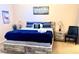 Comfortable main bedroom with modern decor, plush bedding, and stylish nightstands, offering a relaxing retreat at 314 Saddle Ridge Dr, Davenport, FL 33896