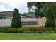 Community entrance sign with manicured landscaping at 3298 Stratton Cir, Kissimmee, FL 34744