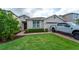 Charming single-Gathering home with manicured lawn and beautiful landscaping at 3298 Stratton Cir, Kissimmee, FL 34744
