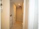 Hallway featuring tile floors and neutral walls at 3298 Stratton Cir, Kissimmee, FL 34744