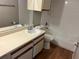 Bathroom with single vanity, tub and toilet at 4301 Lizshire Ln # 306, Orlando, FL 32822