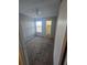 Bright bedroom features neutral walls, a window, and comfortable carpeting at 4301 Lizshire Ln # 306, Orlando, FL 32822