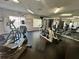 Well-equipped gym with modern exercise machines and mirrored walls, perfect for a complete workout at 4301 Lizshire Ln # 306, Orlando, FL 32822