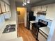 Well-equipped kitchen with stainless steel appliances and ample counter space at 4301 Lizshire Ln # 306, Orlando, FL 32822