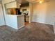 Open living space adjacent to the kitchen, perfect for entertaining guests at 4301 Lizshire Ln # 306, Orlando, FL 32822