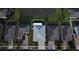 Aerial view highlighting a home backing onto a pond with a spacious backyard at 4337 Summer Breeze Way, Kissimmee, FL 34744