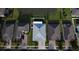 Aerial view highlighting a home backing onto a pond with a spacious backyard at 4337 Summer Breeze Way, Kissimmee, FL 34744