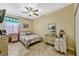 Cozy bedroom with a comfortable bed and natural light at 4337 Summer Breeze Way, Kissimmee, FL 34744