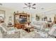 Cozy living room featuring comfortable seating and decorative details at 4337 Summer Breeze Way, Kissimmee, FL 34744