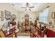 Cozy living room with tile flooring, a ceiling fan, and comfortable seating at 4337 Summer Breeze Way, Kissimmee, FL 34744