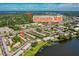 Captivating aerial view emphasizing the community's closeness to Altamonte Mall and beautiful lakefront scenery at 525 Georgetown Dr # D, Casselberry, FL 32707