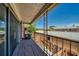 Outdoor balcony space with metal railing overlooking the neighborhood and mature landscaping at 525 Georgetown Dr # D, Casselberry, FL 32707