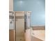 Bathroom featuring a tub, shower and tiled backsplash at 5512 Hamlin Close, Davenport, FL 33896