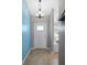 Bright entryway showcasing tiled floors, coat rack and light fixture at 5512 Hamlin Close, Davenport, FL 33896