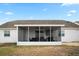 Outdoor screened lanai with ample seating for dining and lounging at 5512 Hamlin Close, Davenport, FL 33896