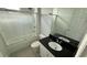 Bathroom featuring a shower-tub combination, a toilet, vanity with granite countertop and cabinets at 5624 Beggs Rd, St Cloud, FL 34771