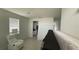 Bright living room featuring tile floors and fresh white paint at 5624 Beggs Rd, St Cloud, FL 34771